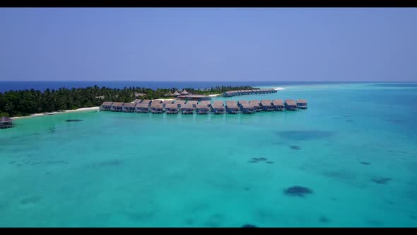 Aerial flying over panorama of marine sea view beach journey by transparent ocean with white sand ba