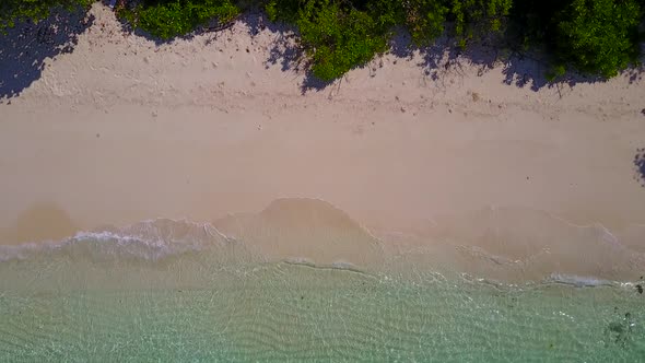 Aerial drone seascape of lagoon beach by blue ocean and sand background