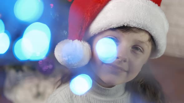 Alone Santa child for Christmas party. alt