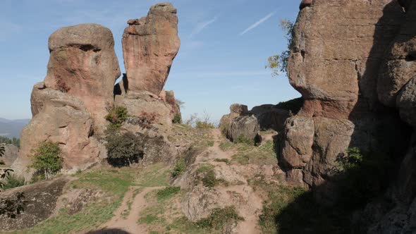 Sandstone rocks near town of Belogradchik slow tilt 4K 2160p 30fps UltraHD footage - Group of strang