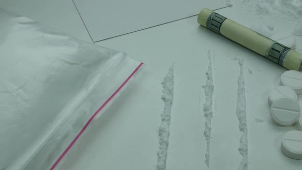 Cocaine Strips And Tablets On The Table Are Ready For Use