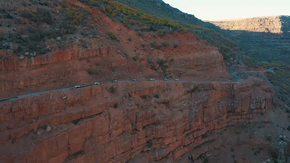 Cars Drive on the Mountain and Rush Along the Serpentine