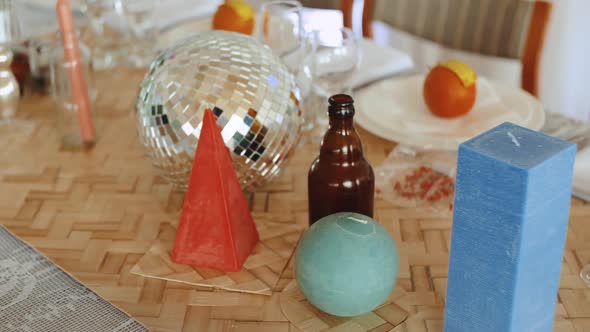 Close Up Festive Table Decor In Colors with Oranges on Plates