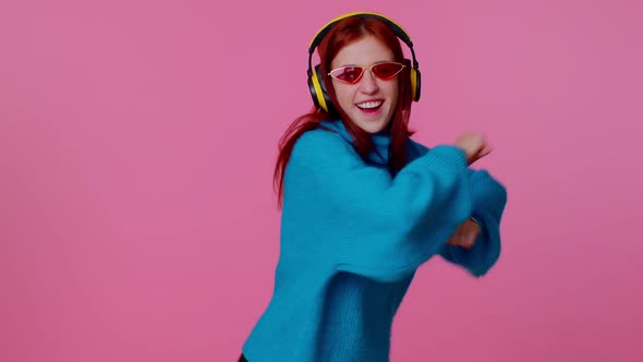 Cheerful Attractive Girl Listening Music Via Headphones and Dancing Disco Fooling Around Having Fun