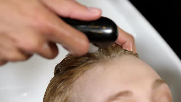 Woman getting her hair wash