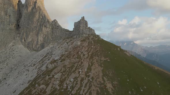 Aerial view: Dolomites in Val Gardena, Italy. Astonishing panorama, high mountain peak with sky and