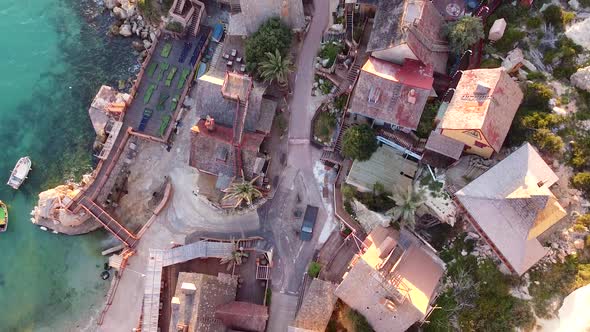 Narrow streets of local wooden fisherman village, aerial top down view