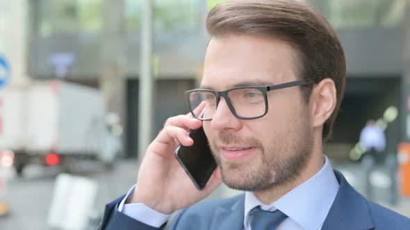 Close up of Businessman Talking on Smartphone, Outdoor