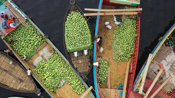 Aerial view of people working on commercial boats, Buriganga, Dhaka, Bangladesh.