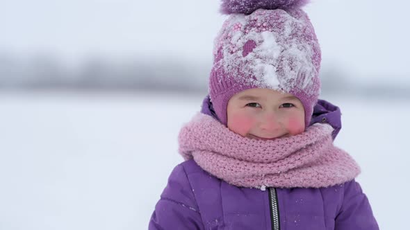 funny little girl in outerwear