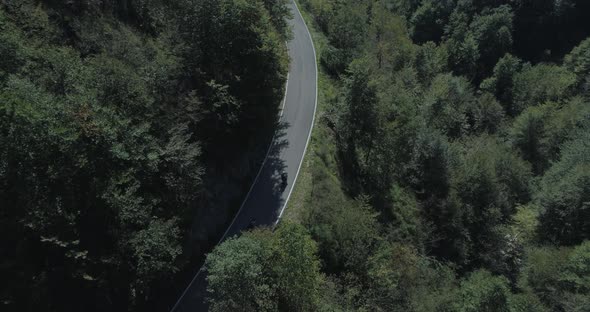 Bikers on mountain road, Italian Alps, Italy