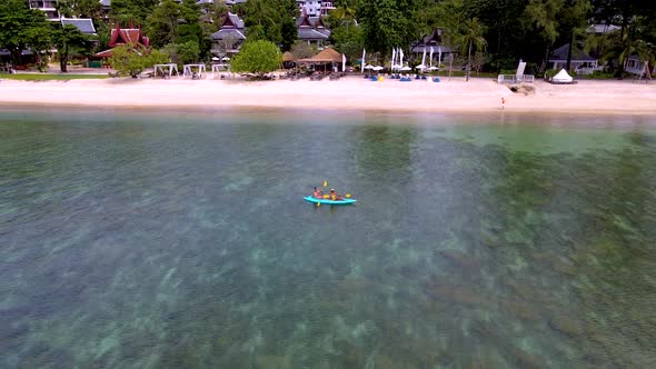 Couple Man and Woman in Kayak Phuket Thailand