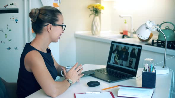 One Worker Videocalls Via Laptop, Staying Home During Pandemic. Woman Using Video Conferencing