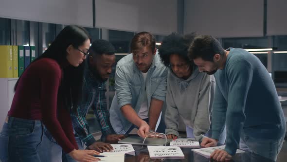 Happy Diverse Businesspeople Smiling at Camera Having Meeting in Modern Office