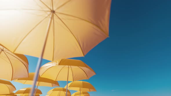 Beach umbrellas against blue sky