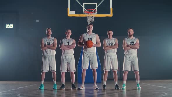 Performance Team of Basketball Players Stands on the Playground the International Basketball