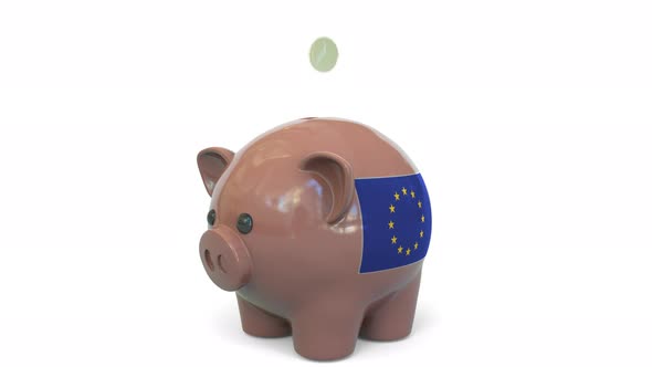 Putting Money Into Piggy Bank Flag European Union