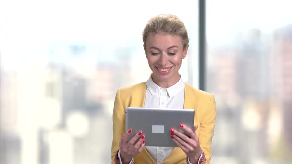 Successful Business Woman Using Digital Tablet.