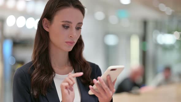 Online Business, Businesswoman Browsing Internet on Smartphone