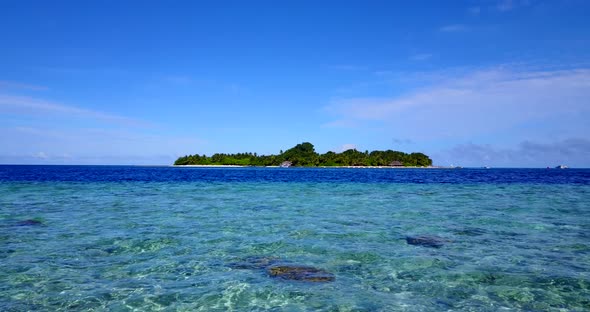 Tropical drone copy space shot of a white sandy paradise beach and aqua turquoise water background i