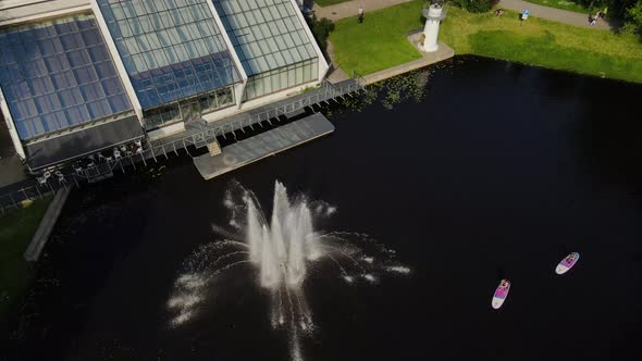 Riga Latvia Drone View of a Fountain Near the Shore of Daugava River