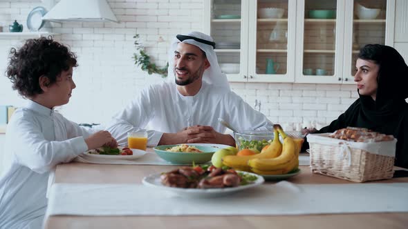 arabian family spending time together at home