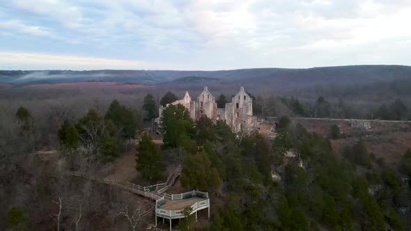 Medieval Castle Ruins in American Midwest Landscape, Aerial Approach