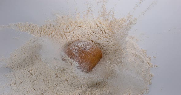 Bread Falling in Flour, Slow Motion 4K
