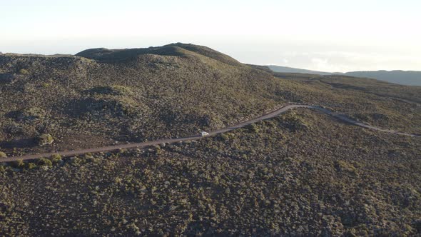 Aerial view of a car driving a serpentine road, Reunion.