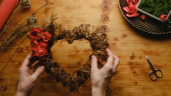 Female Hands with Valentines Day DIY Decoration