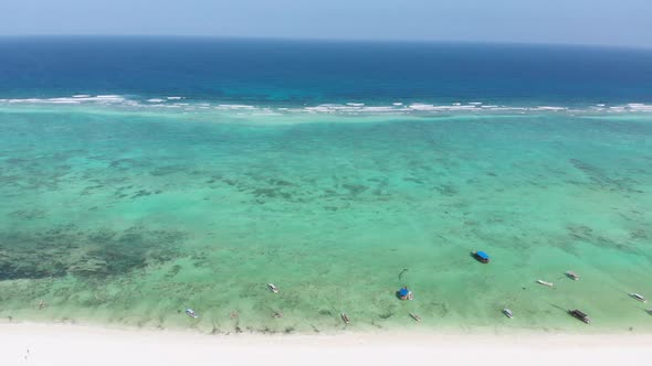 Ocean Coastline Barrier Reef By Beach Hotels at Low Tide Zanzibar Aerial View