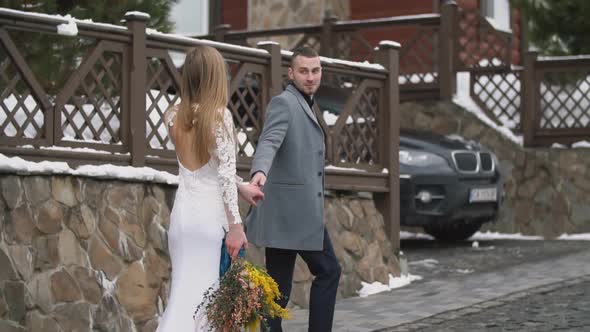 Couple Walking Down the Street