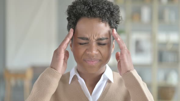 Portrait of Exhausted African Girl Having Headache