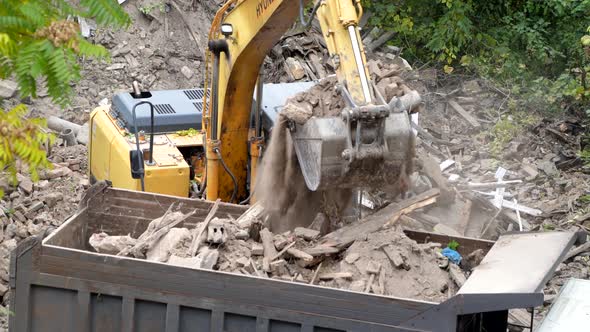 Demolition of Ancient Historical Buildings Excavator Breaks Down an Old Vintage House