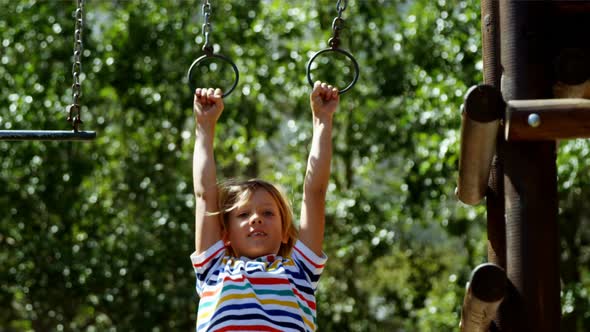 Schoolboy playing in playground