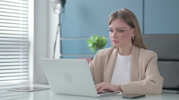 Businesswoman Closing Laptop Standing Up Going Away