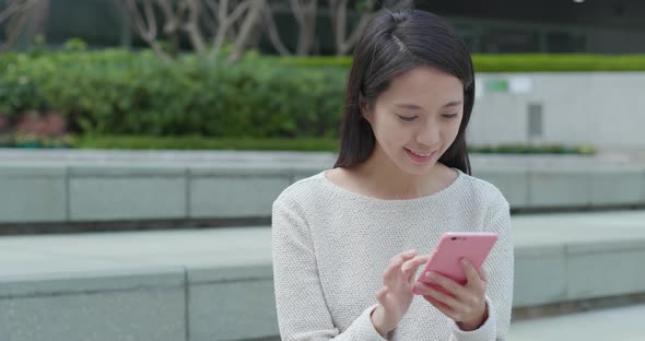 Woman use of smart phone at outdoor