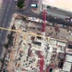 Flight over constructions site development, heavy machinery and construction workers are working - VideoHive Item for Sale