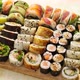 Above View of Various Sushi and Rolls Placed on Wooden Board - VideoHive Item for Sale