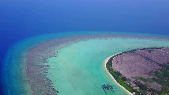 Aerial drone tourism of coastline beach by blue sea with sand background