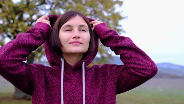 Portrait of Confident Asian Woman Student Smiling Laughing Nature Background Wearing Hoodie