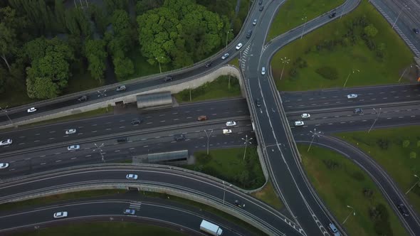 Aerial View Flying Over of Loaded Cars with Traffic Jam at Rush Hour on Highway with Bridge