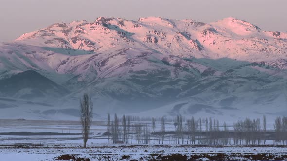 First Lights of Morning With Sunrise Come to Top of the Mountain