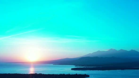 Wide flying abstract view of a white sandy paradise beach and aqua turquoise water background in vib