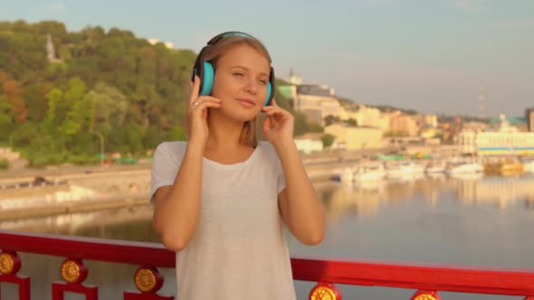 Woman Listens To the Music