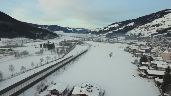 Aerial view of a railway and houses in Kitzbuhel