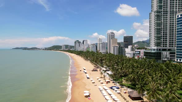 aerial tropical view of an asian beach city in Vietnam called Nha Trang. With beautiful white sand b