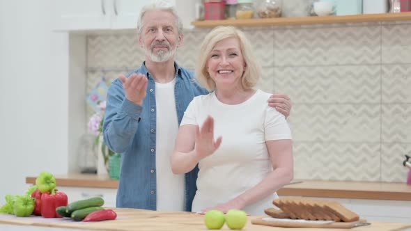 Old Couple Talking on Video Call in Kitchen