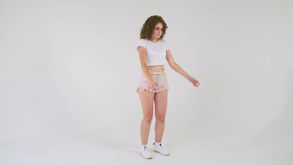 Girl Dancing on a White Background