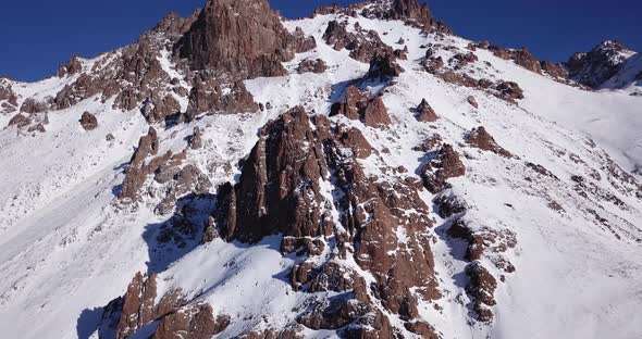 Huge Rocks Covered with Snow